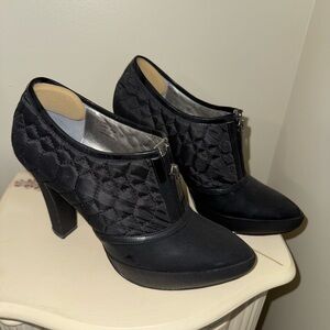 Calvin Klein Black Heeled Boots with Quilted Design